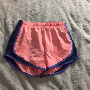 Pink and blue nike dri-fit running shorts